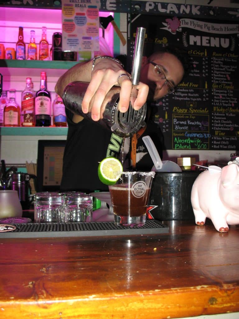 Piggie making a cocktail.